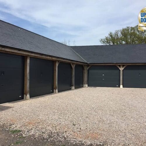 Overlap Garage Doors in Anthracite Grey on Oak Barn