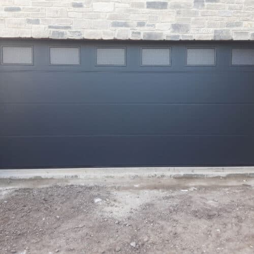 Large Rib Insulated Sectional Garage Door in Anthracite Grey with Colour Matched Windows