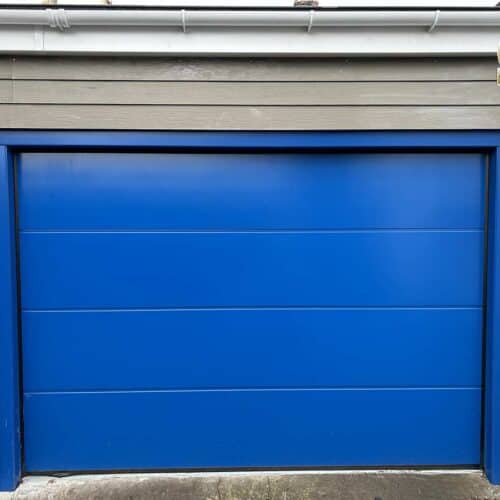 Large-Rib-Insulated-Sectional-Garage-Door-in-Gentian-Blue-with-Matching-Frame